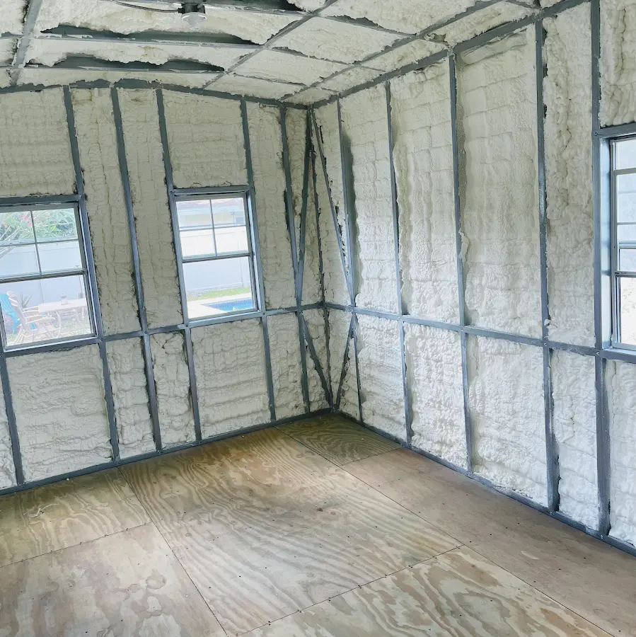 Closed-cell spray foam insulation applied to wall cavities in a residential project in Locust